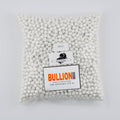 Image of small, 6mm zirconia tumbling media, resembling tiny, smooth, shiny spheres with a metallic sheen. They are neatly packed in BullionCare packaging, which is a sturdy, clear plastic container with a secure lid. 